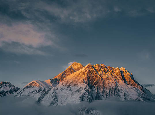 A golden washed image of Mt Everest