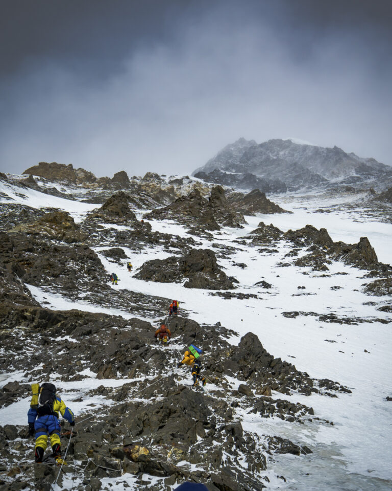 Climbers ascending toward Camp 1 on winter K2