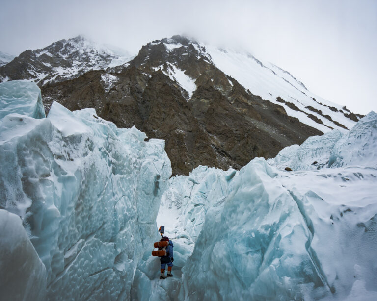 Climbers moving through the icefall on winter K2