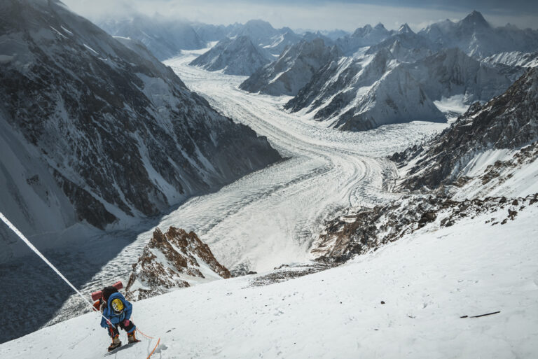 Wide shot of Fazal Ali on the fixed line on winter K2